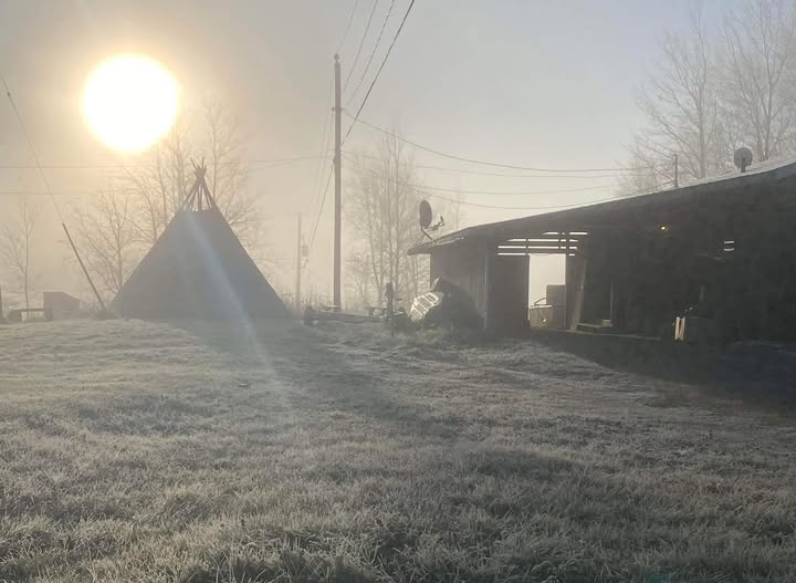 Foggy tipi on the land